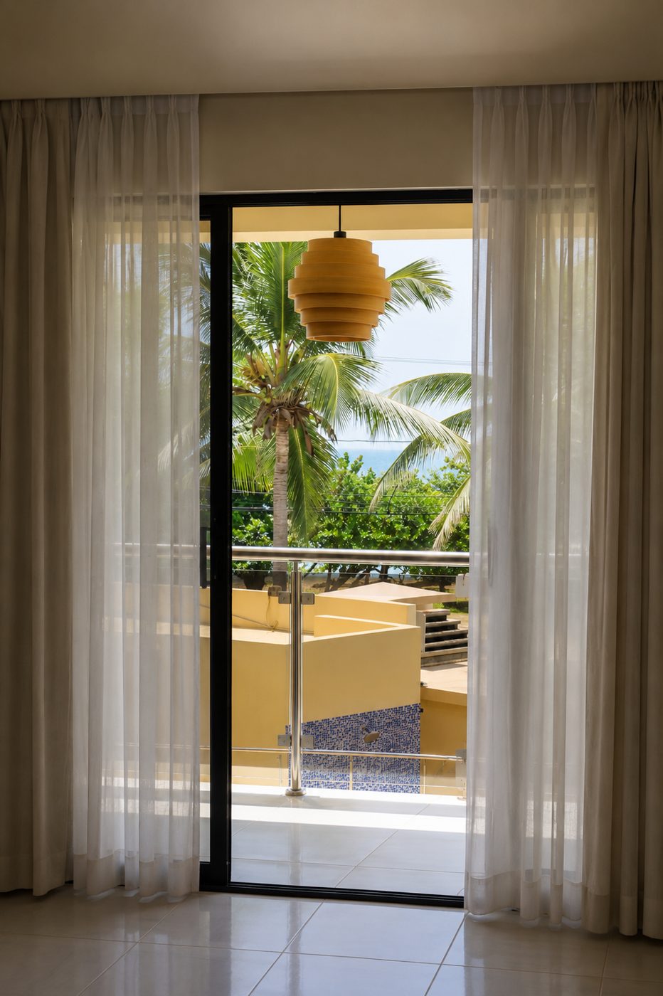 2-bedroom suite: balcony door with palm trees and ocean view