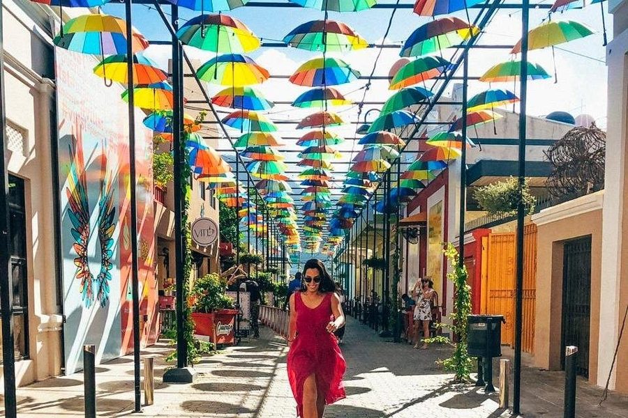 Colorful umbrella-covered street in Puerto Plata